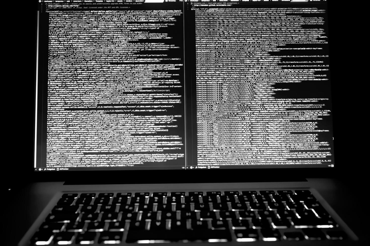 Modern office environment showing collaborative workspace and professional development setup